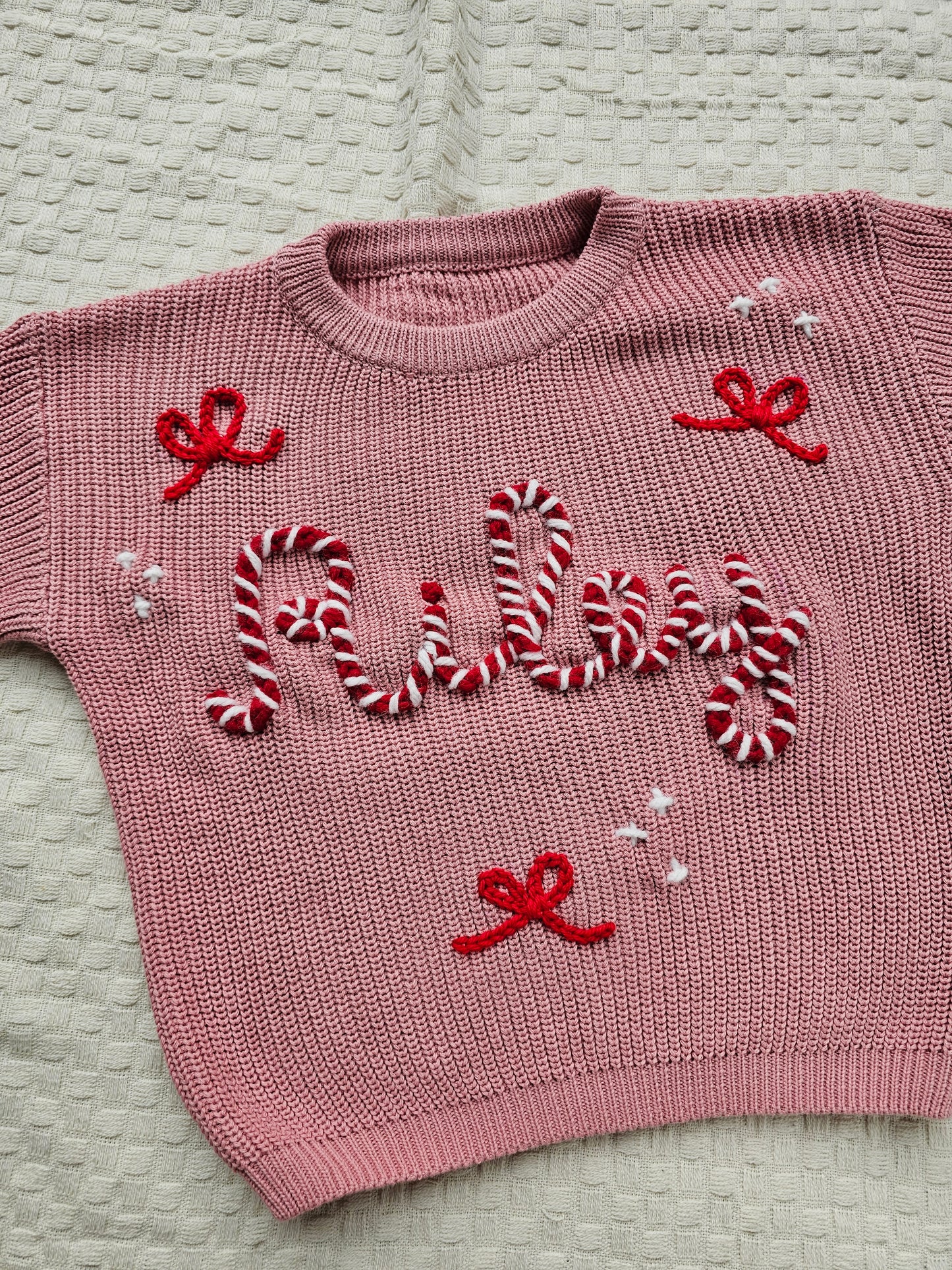 Kerstsweater: candynaam+strikjes en sterren