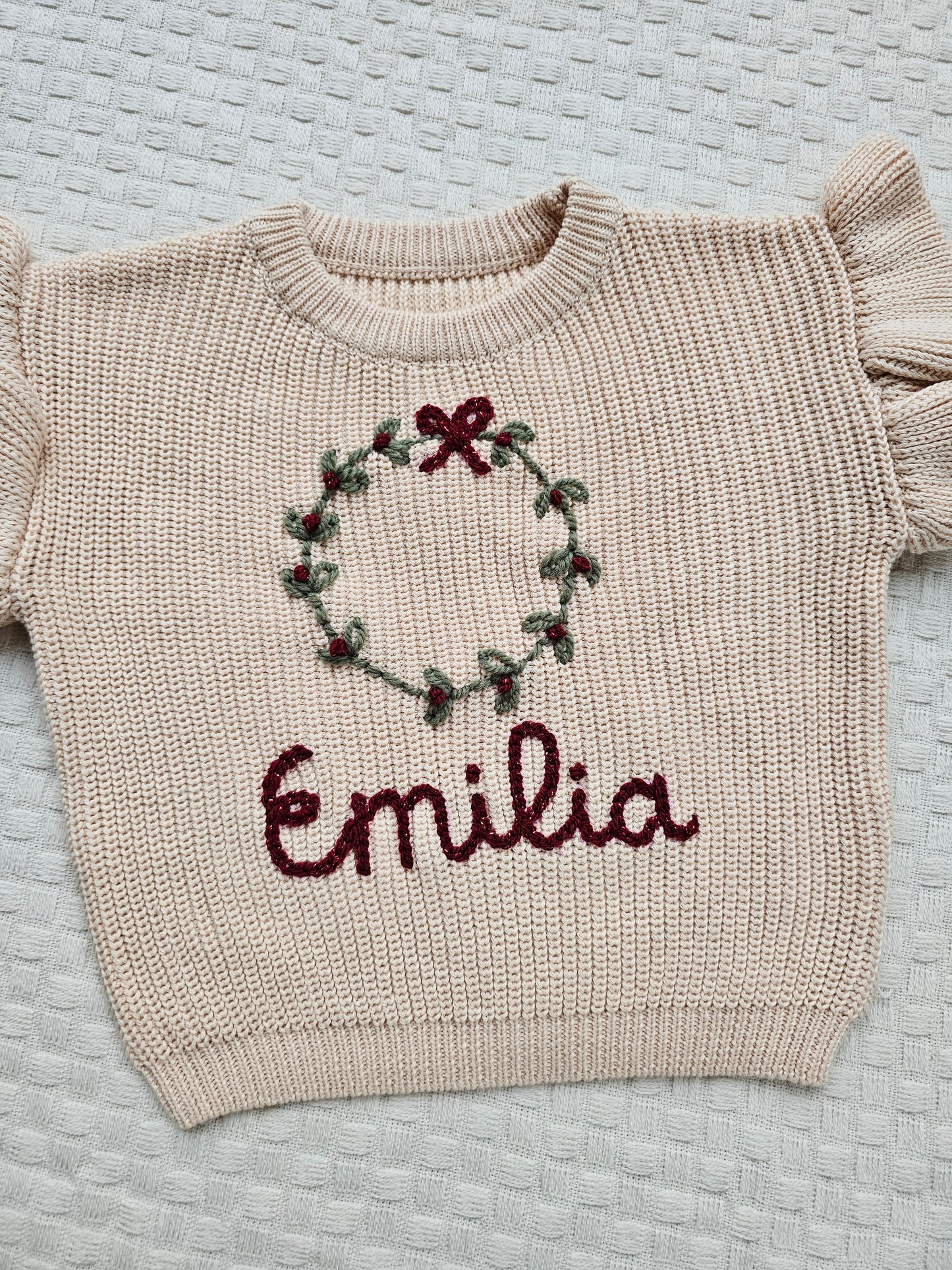 Kersttrui krans franjes beige