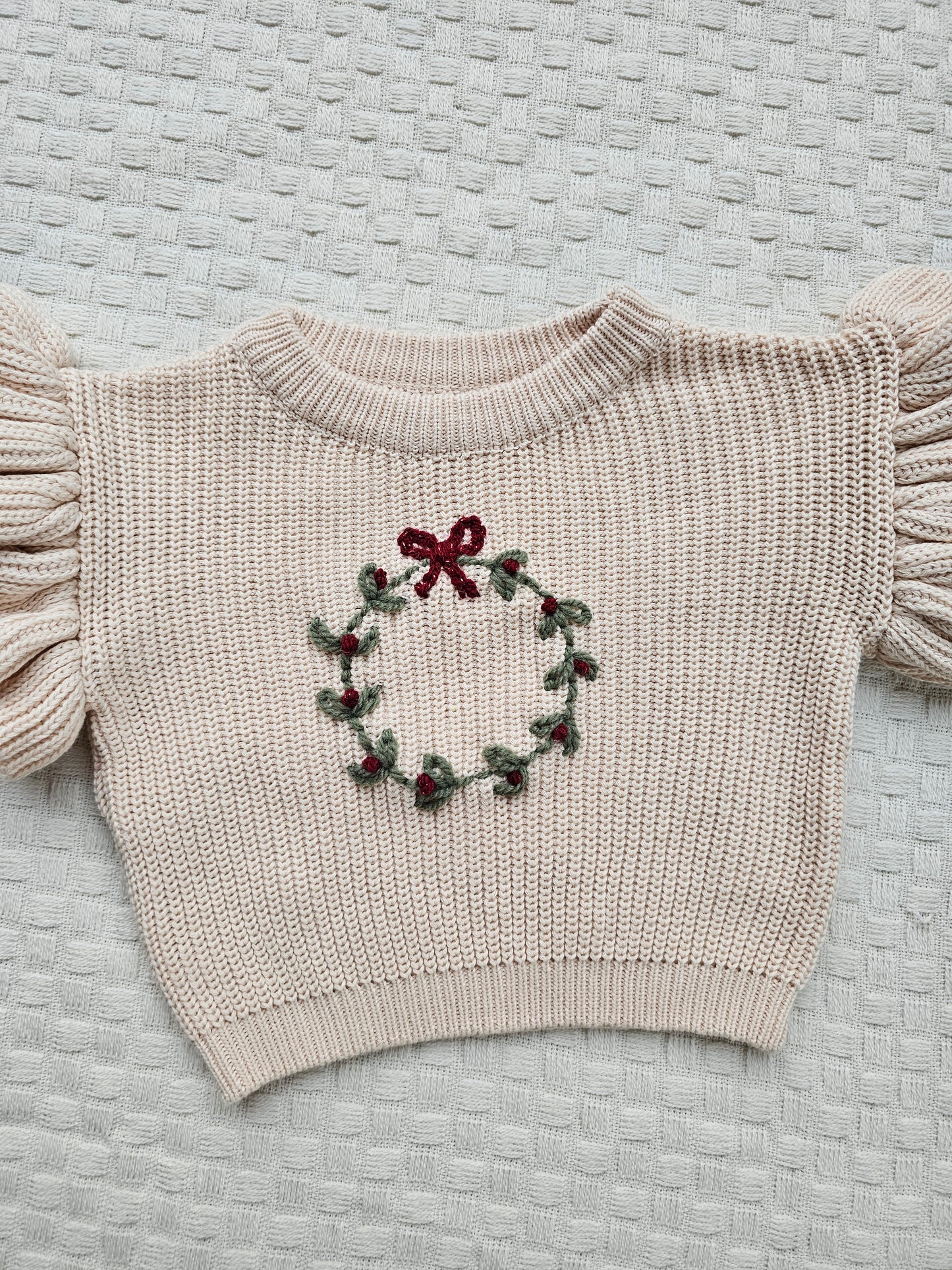 Kersttrui krans franjes beige