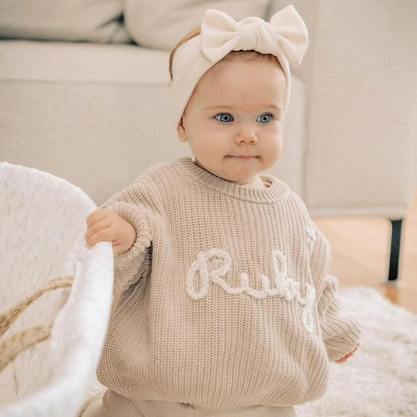Sweater met naam en bloem