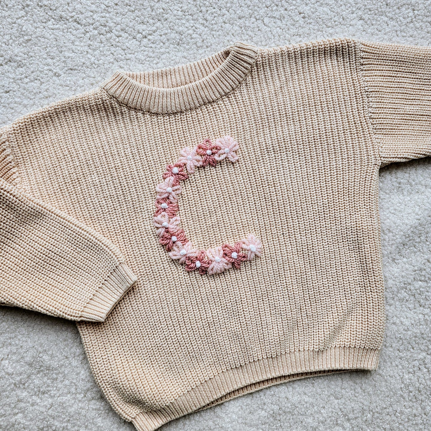 Sweater bloemenletter