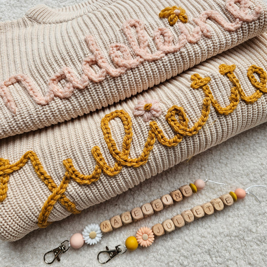 Sweater met naam en bloem