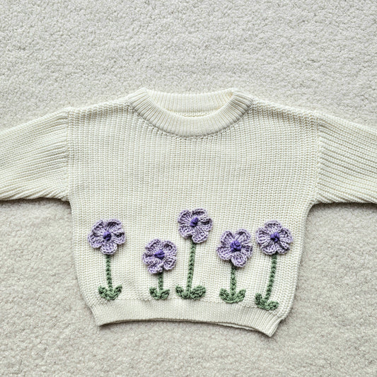 Sweater wit/paarse bloemen 3/6 maand