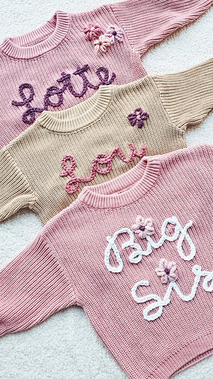 Sweater met naam en bloem