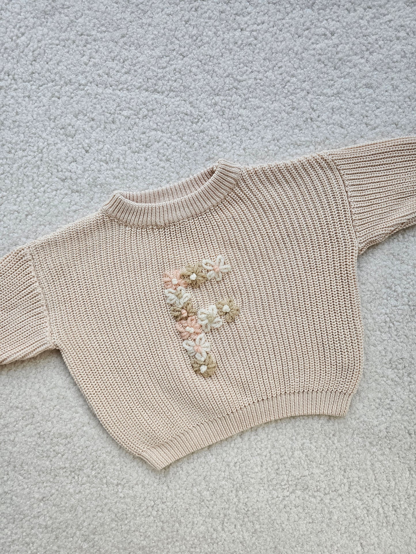 Sweater bloemenletter